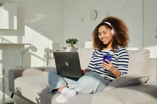 Happy Woman Using Laptop photo