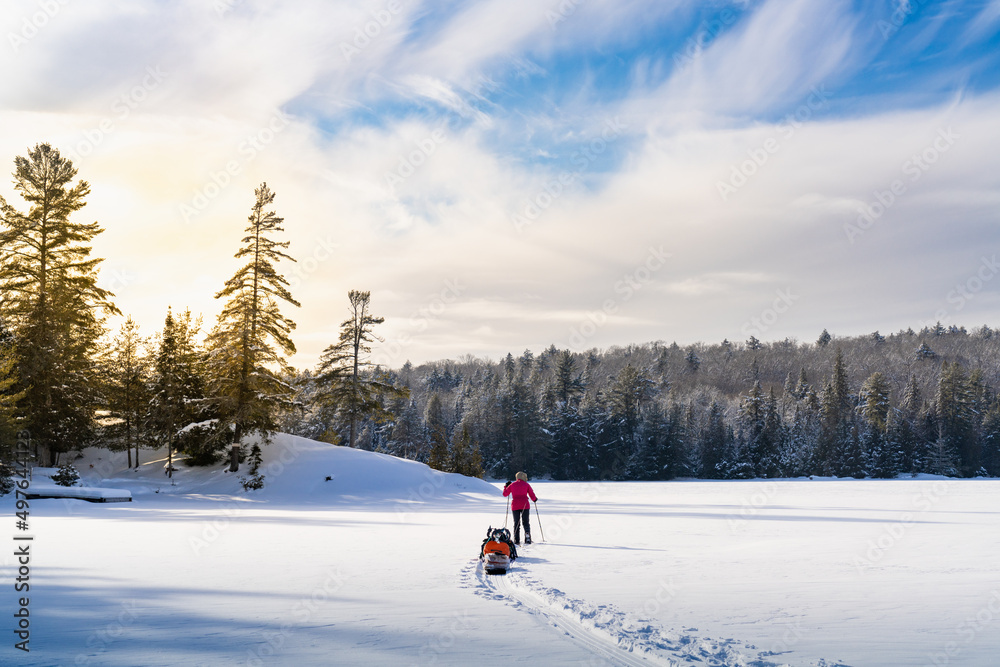 Winter Camping Gear on Frozen Lake Winter Camping Gear on Frozen Lake