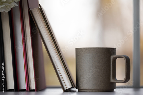 Coffee mug by the window photo