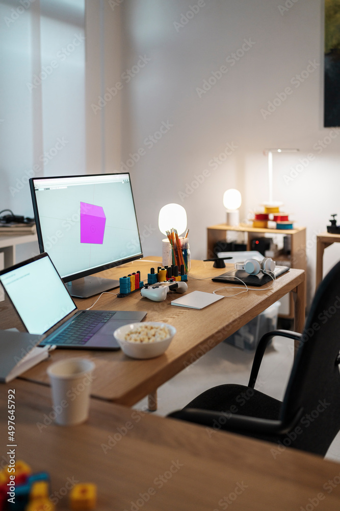 Designer workplace with netbook and computer Designer workplace with netbook and computer