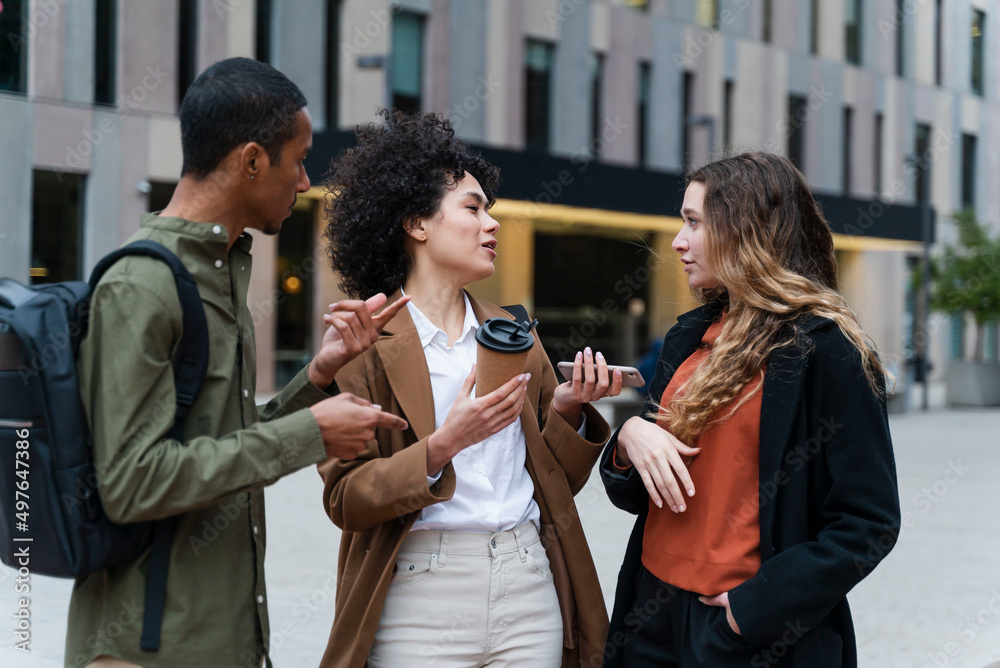 Business Colleagues Talking On The Street Business Colleagues Talking On The Street