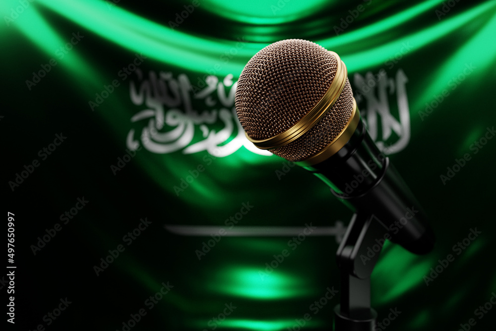 Microphone on the background of the National Flag of Saudi Arabia, realistic 3d illustration. music award, karaoke, radio and recording studio sound equipment