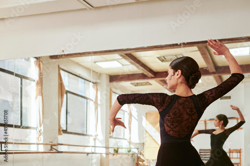 Flamenco performer dancing alone in a studio