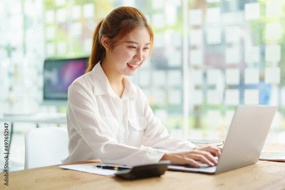 data analysis, plan, marketing, accounting, audit, Portrait of asian business woman planning marketing using computer and statistical data sheet to present marketing plan project at meeting. data analysis, plan, marketing, accounting, audit, Portrait of asian business woman planning marketing using computer and statistical data sheet to present marketing plan project at meeting.