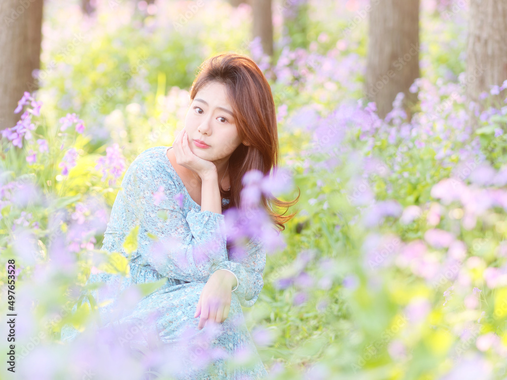 Portrait of elegant Chinese girl in dress enjoy carefree time in forest park in sunny day. Outdoor fashion portrait of glamour young Chinese cheerful stylish woman. Portrait of elegant Chinese girl in dress enjoy carefree time in forest park in sunny day. Outdoor fashion portrait of glamour young Chinese cheerful stylish woman.