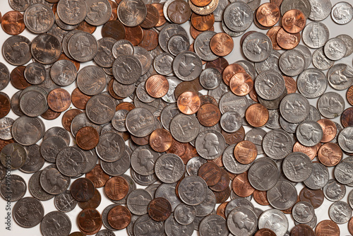 Pile of coins on a white background