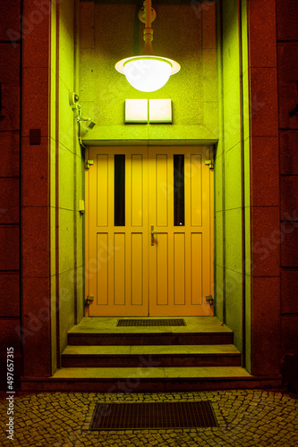 A door at night time. photo