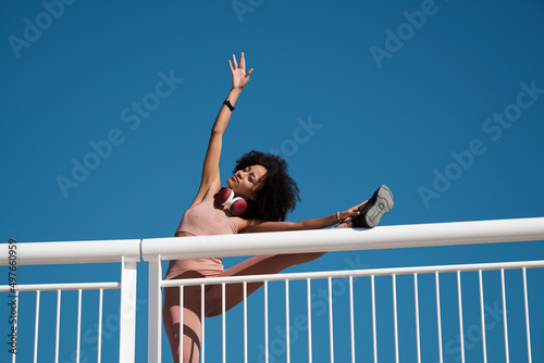 Active woman doing fitness outdoors