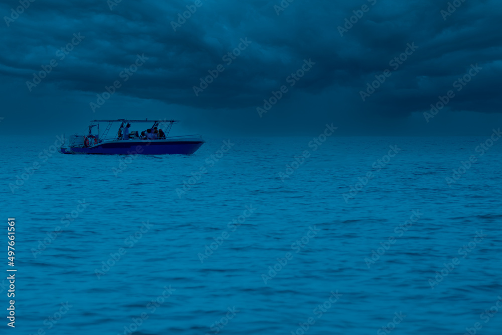 Naklejka premium speedboat takes tourists back from diving at Samae San Island, Chonburi Province.