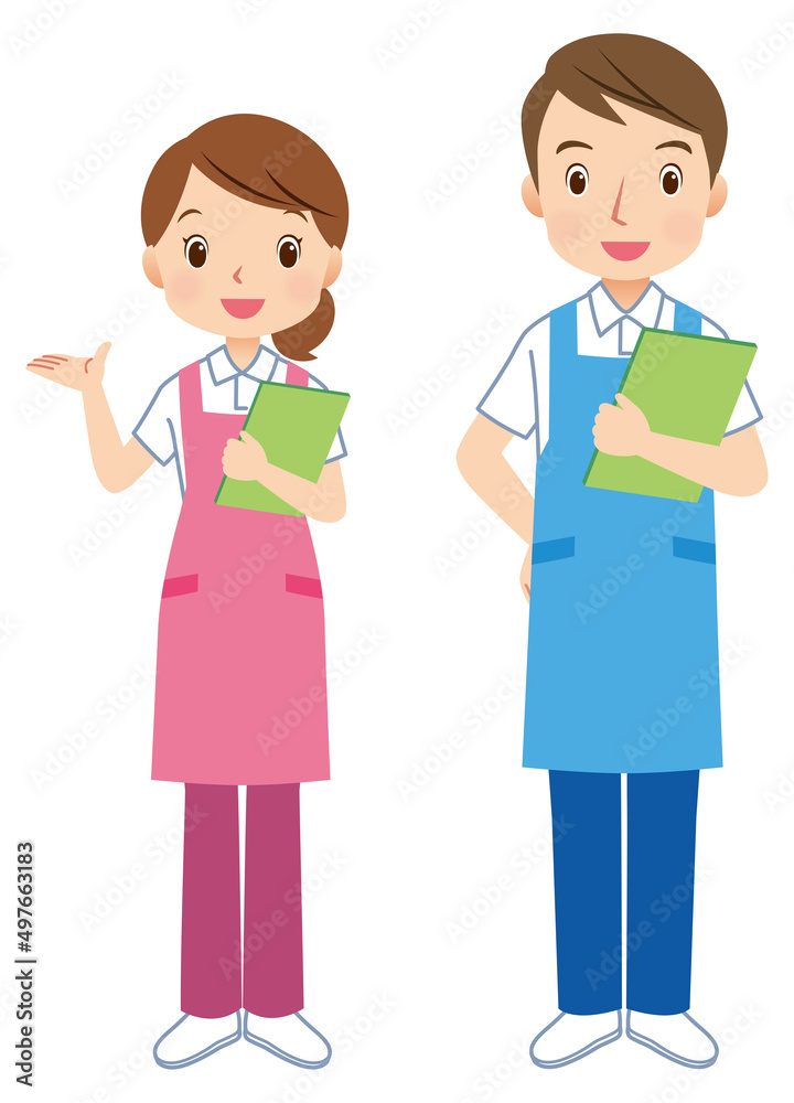 エプロンをつけた男女　案内する介護士　スタッフ