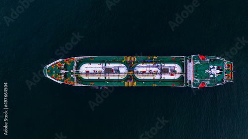 Aerial top view LPG tanker ship at sea, Aerial view white Liquefied Petroleum Gas tanker vessel boat, Tanker ship logistic and transportation business oil and gas industry. © Kalyakan