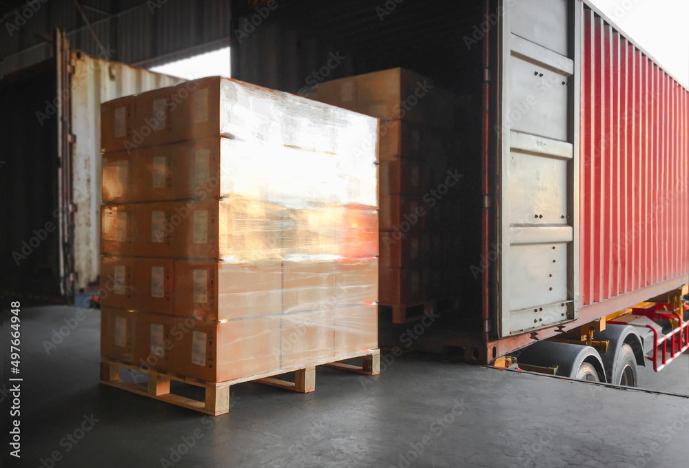 Packaging Boxes Stacked Wrapped Plastic on Pallets Loading with