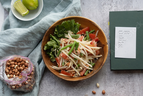 Preparing papaya salad photo