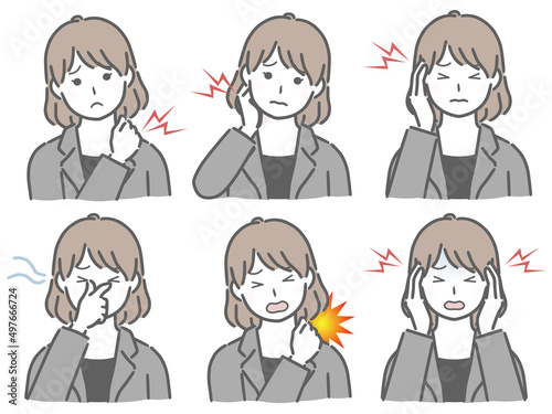 色々な部分が痛むスーツの若い女性