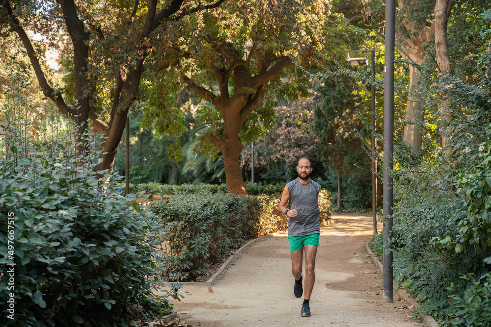 Sportsman With Disability Running In The Park Sportsman With Disability Running In The Park