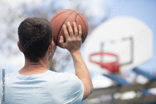 male basketball player making a shot