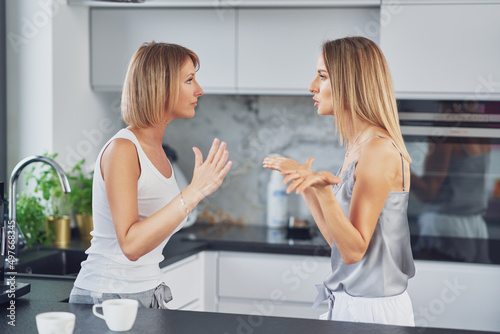 Quadro su tela Nice two adult girls in the housethe are arguing