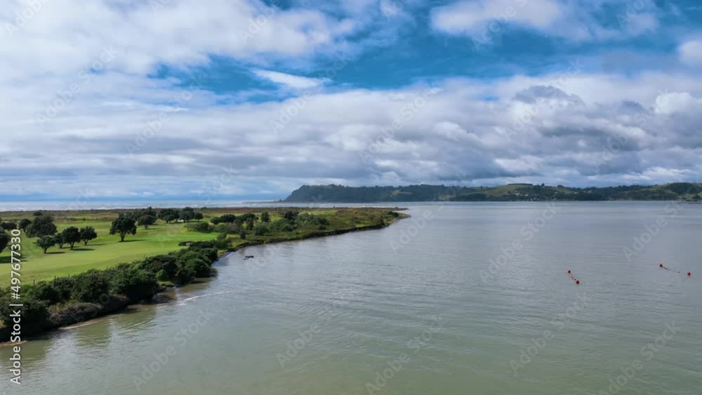 Fly over still waters of Ohiwa Harbour parallel to Ohope Peninsular - NZ Fly over still waters of Ohiwa Harbour parallel to Ohope Peninsular - NZ