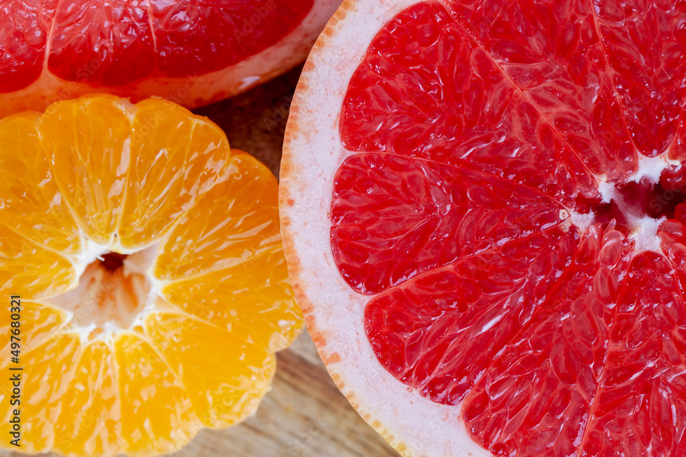 ripe red grapefruit, sliced and sliced into pieces ripe red grapefruit, sliced and sliced into pieces