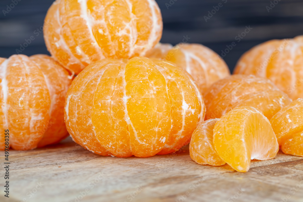 group of orange tangerines without peel group of orange tangerines without peel