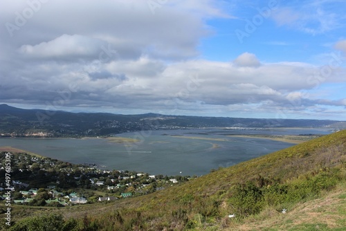 Landscape with cloudy sky - the town Knysna in Western Cape seen from a hill