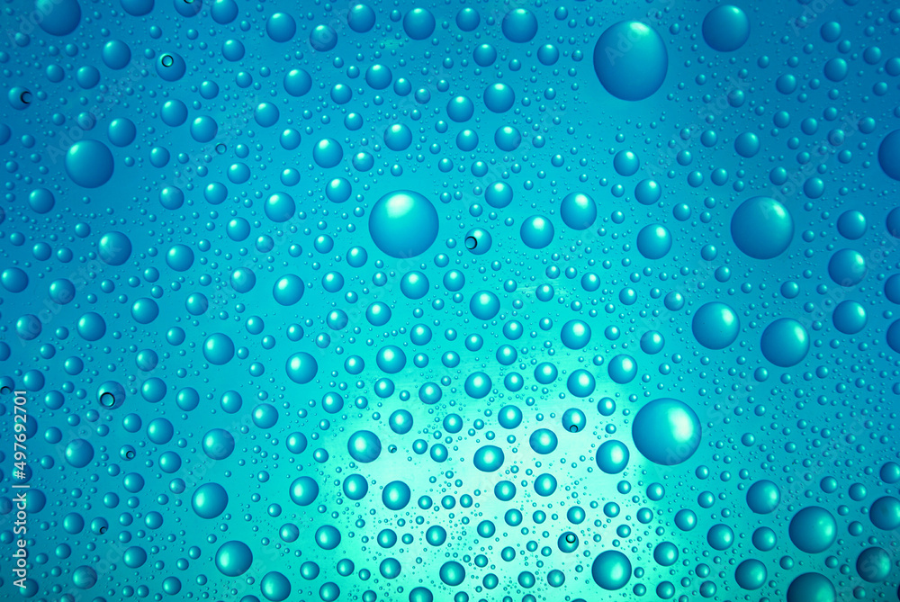  water drops over blue background.