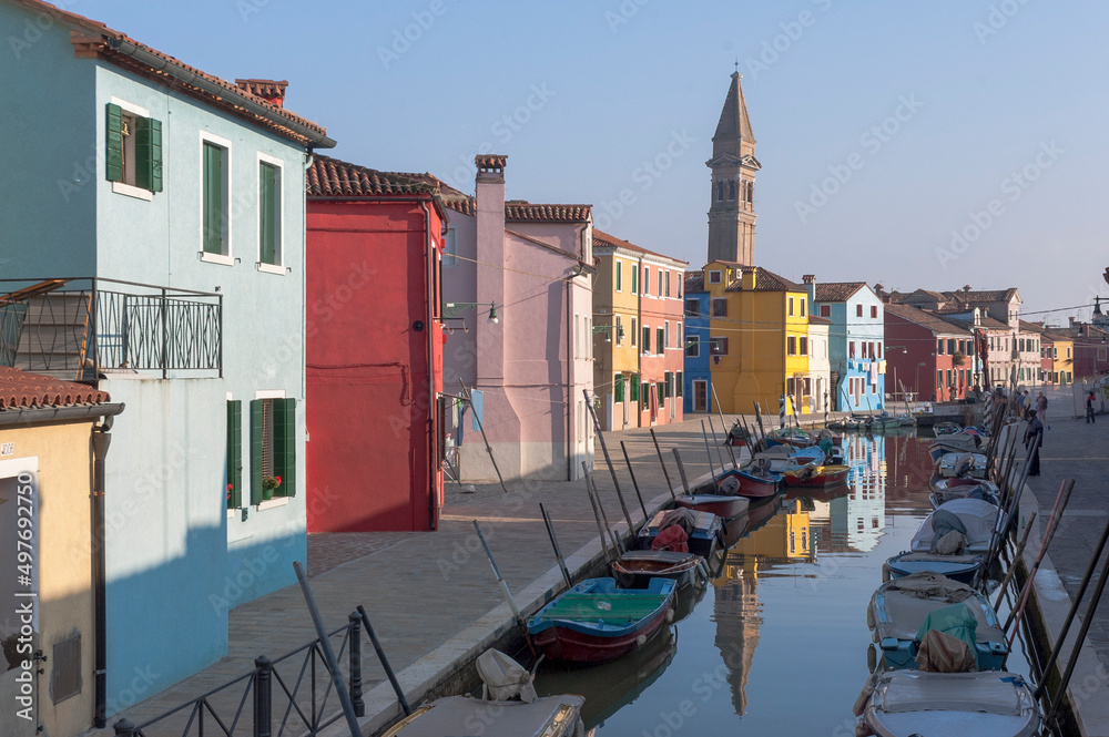 Burano, Venezia. fondamenta and canal with reflected houses