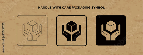 Handle with Care vector packaging symbol on vector cardboard background. Handling mark on craft paper background