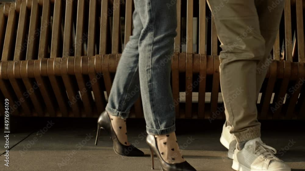 Date. Legs of a guy and a girl.