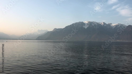 Lake Geneva with Alps mountains in sunrise time (ID: 497699766)