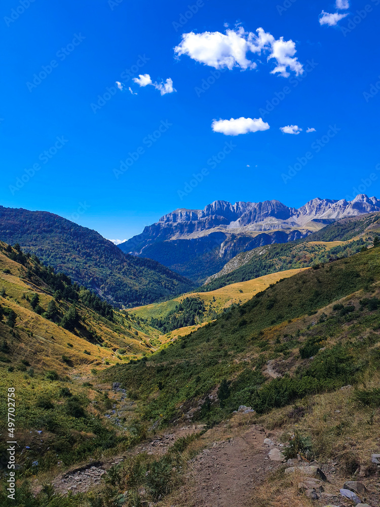 Beautiful valley surrounded by rocky mountains Beautiful valley surrounded by rocky mountains