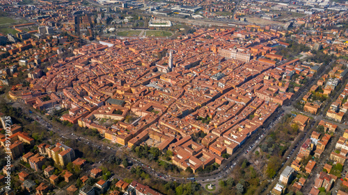 Aerial view on the historic center of Modena surrounded by tree-lined avenues. In the center stands the Ghirlandina tower. photo