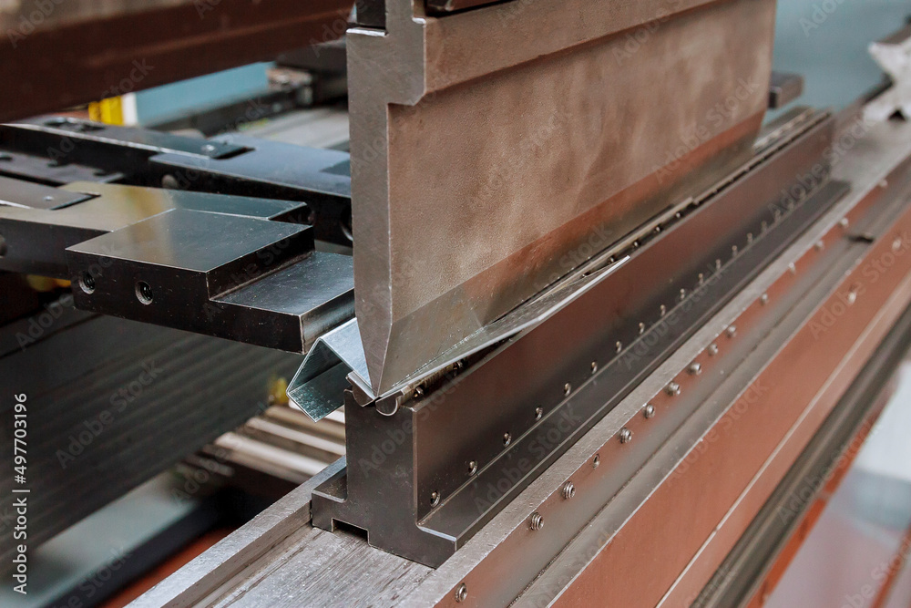 The process of bending galvanized sheet metal 2 millimeters thick on a special machine for