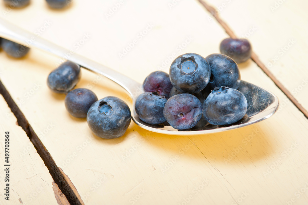 fresh blueberry on silver spoon fresh blueberry on silver spoon