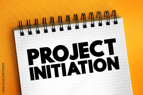 Project initiation - first step in starting a new project, text concept on notepad for presentations and reports