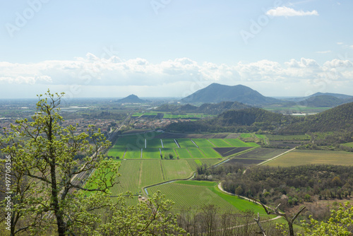 Hilly landscape. Trail on Monte Ceva. Aerial view of the Terme Euganee, Padua and the cultivated fields. Green spring landscape. photo