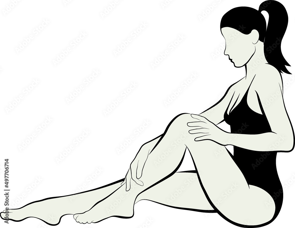 young woman massaging her leg young woman massaging her leg