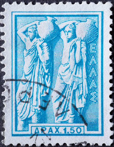 Greece - circa 1954: a postage stamp from Greece, showing Ancient Greek Art. two urn bearers