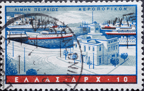 Greece - circa 1958: a postage stamp from Greece, showing a cityscape of the harbor - Piraeus in Athens photo