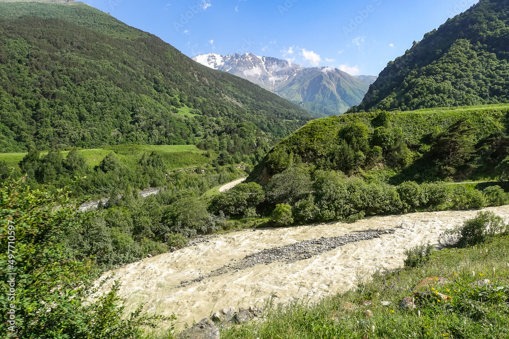 View of the Chegem gorge near the waterfall Abai-Su. Kabardino-Balkaria June 2021. View of the Chegem gorge near the waterfall Abai-Su. Kabardino-Balkaria June 2021.