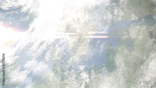 Earth zoom in from outer space to city. Zooming on Jonkoping, Sweden. The animation continues by zoom out through clouds and atmosphere into space. Images from NASA photo