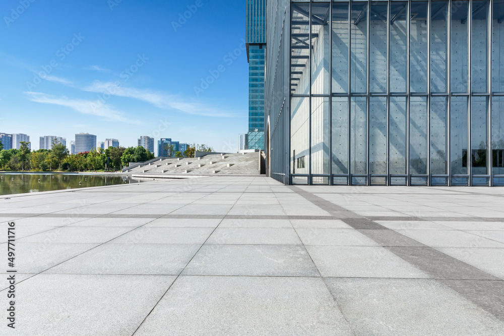 Empty square floor and city skyline with modern commercial buildings in Shanghai, China.