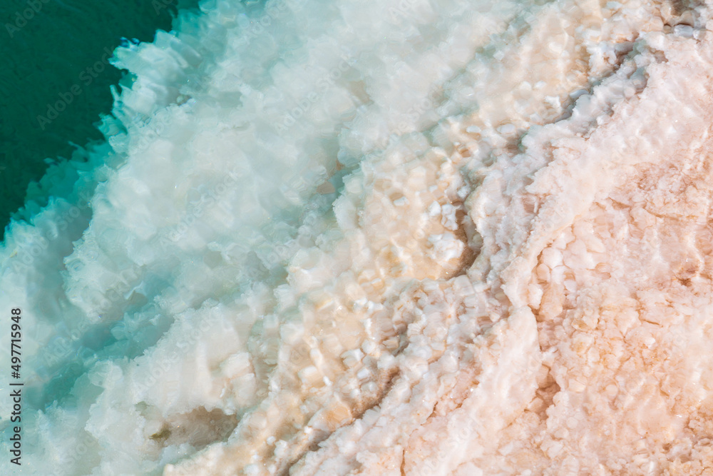 Natural Salt water lake in desert. Oasis in Siwa, Egypt. Tourism spot in Egypt. Closeup turquoise water and white salt Natural Salt water lake in desert. Oasis in Siwa, Egypt. Tourism spot in Egypt. Closeup turquoise water and white salt