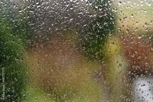 Defocus effect of raindrops stuck to the window, giving the impression of sadness. nature background. photo