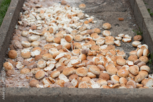 Dry bread thrown on the street. 
