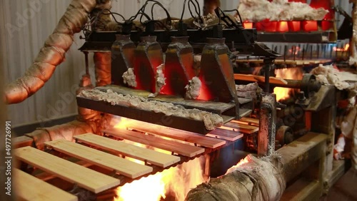 Semi-automatic machine for brushing wooden parts with an open fire. The wood treated with fire becomes less combustible and is practically not subject to rotting and spoilage by insects. photo