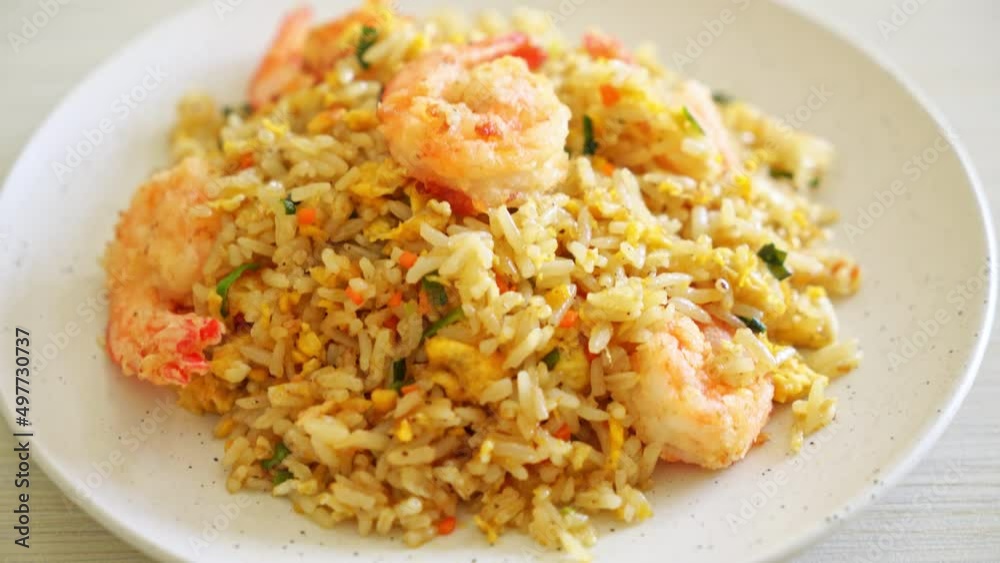 homemade fried shrimps fried rice on plate in Thai style - Asian food style homemade fried shrimps fried rice on plate in Thai style - Asian food style