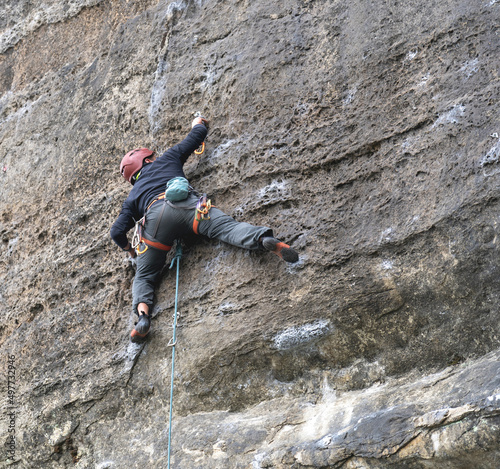 Woman in a rock climbing wall
