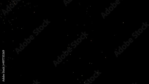 Abstract Gold flying Stars and Bokeh Glitter dust Particles Trail Crossing the screen on black background 4K. Birthday, Anniversary, new year, event, Christmas, Festival, Diwali. photo