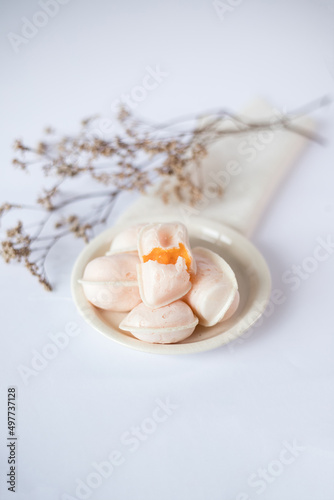 Soft eggs  Ovos Moles  from Aveiro  Portugal. Traditional sweet from Portuguese regional cuisine. Sweet based on egg yolk  sugar water and wafers.